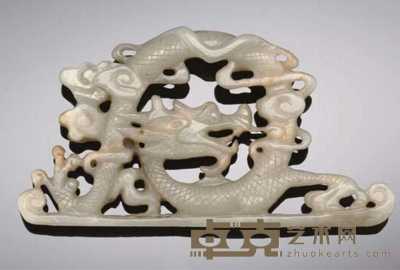 17th Century A pale celadon and russet jade dragon brushrest 